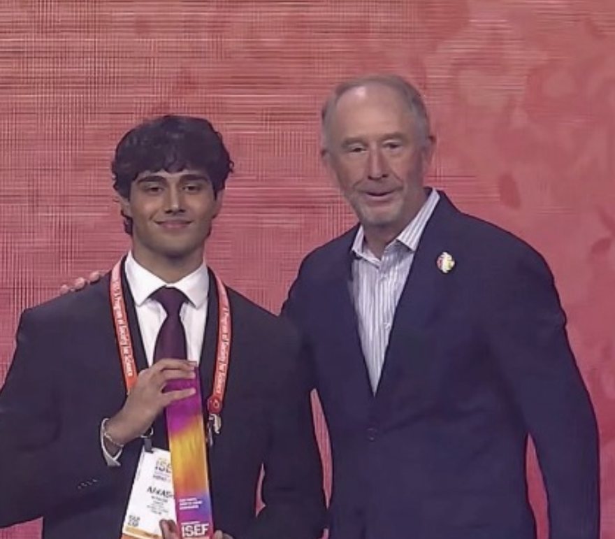 Receiving the Peggy Scripps Award on the ISEF stage