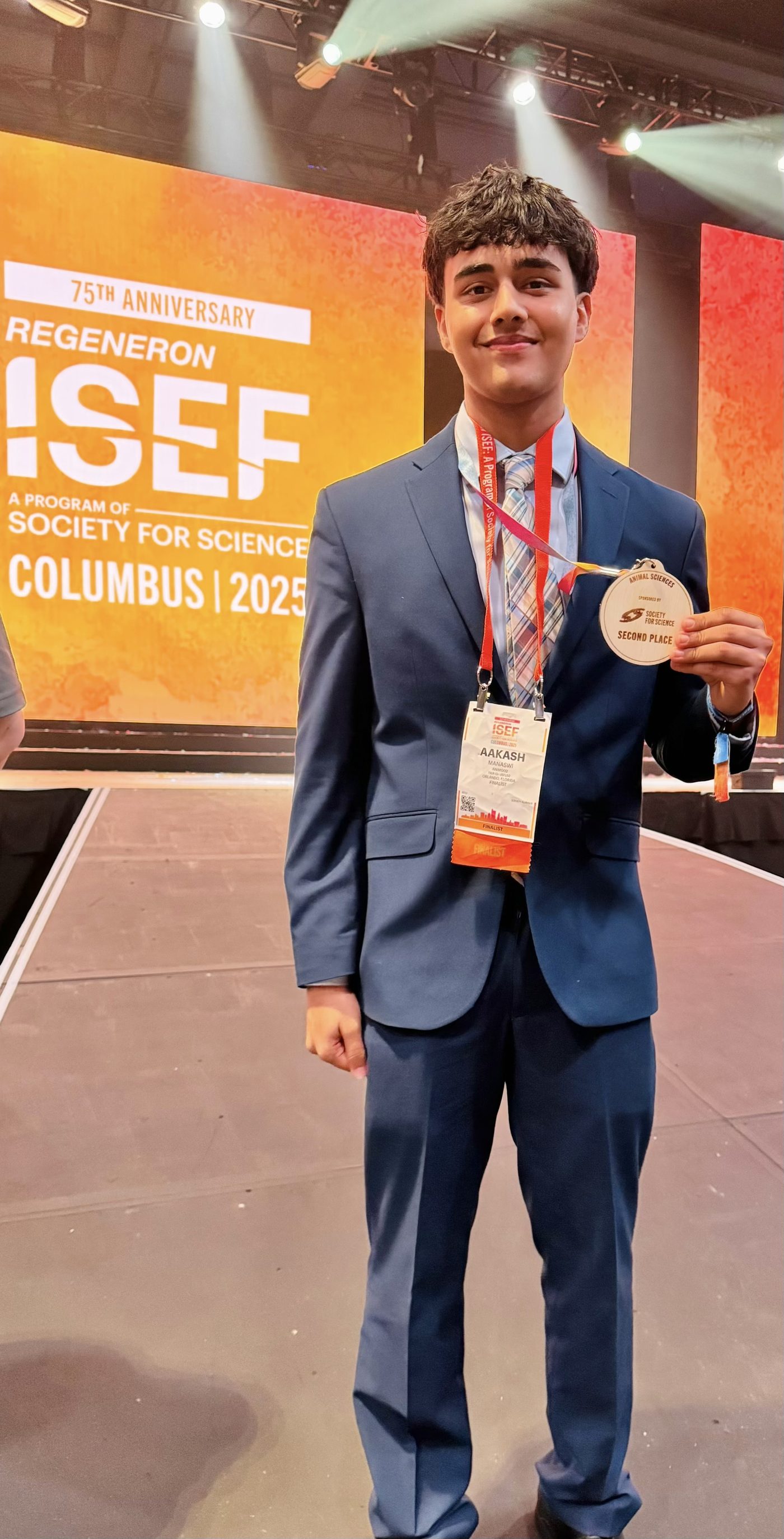 ISEF medal on stage